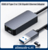 Grijze netwerkadapter met USB-A connector op de voorgrond en tekst "USB3.0/Type C to 2.5G Gigabit Ethernet Adapter"
