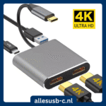 Grijze 4-in-1 USB-C adapter met aansluitingen voor Dual HDMI, USB 3.0 en USB-C PD opladen.