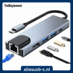 Grijze USB-C adapter met netwerkaansluiting en dubbele USB 3.0 poorten