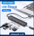 Zwarte Vention USB-C hub 10Gbps aangesloten op laptop