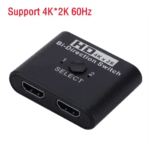 Zwarte 4K HDMI switch dongle met opschrift 'HD 4K x 2K Bi-Direction Switch' en selectieknop.
