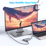 Laptop aangesloten op een externe monitor met een haarscherpe walvis-afbeelding via de 4K 60Hz HDMI-poort.