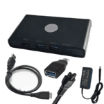 De complete set getoond: het zwarte docking station, USB-kabel, voedingsadapter en handleiding.
