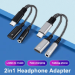 Twee gevlochten USB-C adapters naast elkaar in de kleuren zwart en zilver