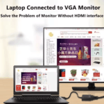 Werkplek setup met laptop verbonden aan een tweede VGA monitor via adapter