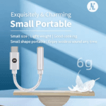 Weegschaal illustratie die toont dat de adapter slechts 6 gram weegt naast een veer